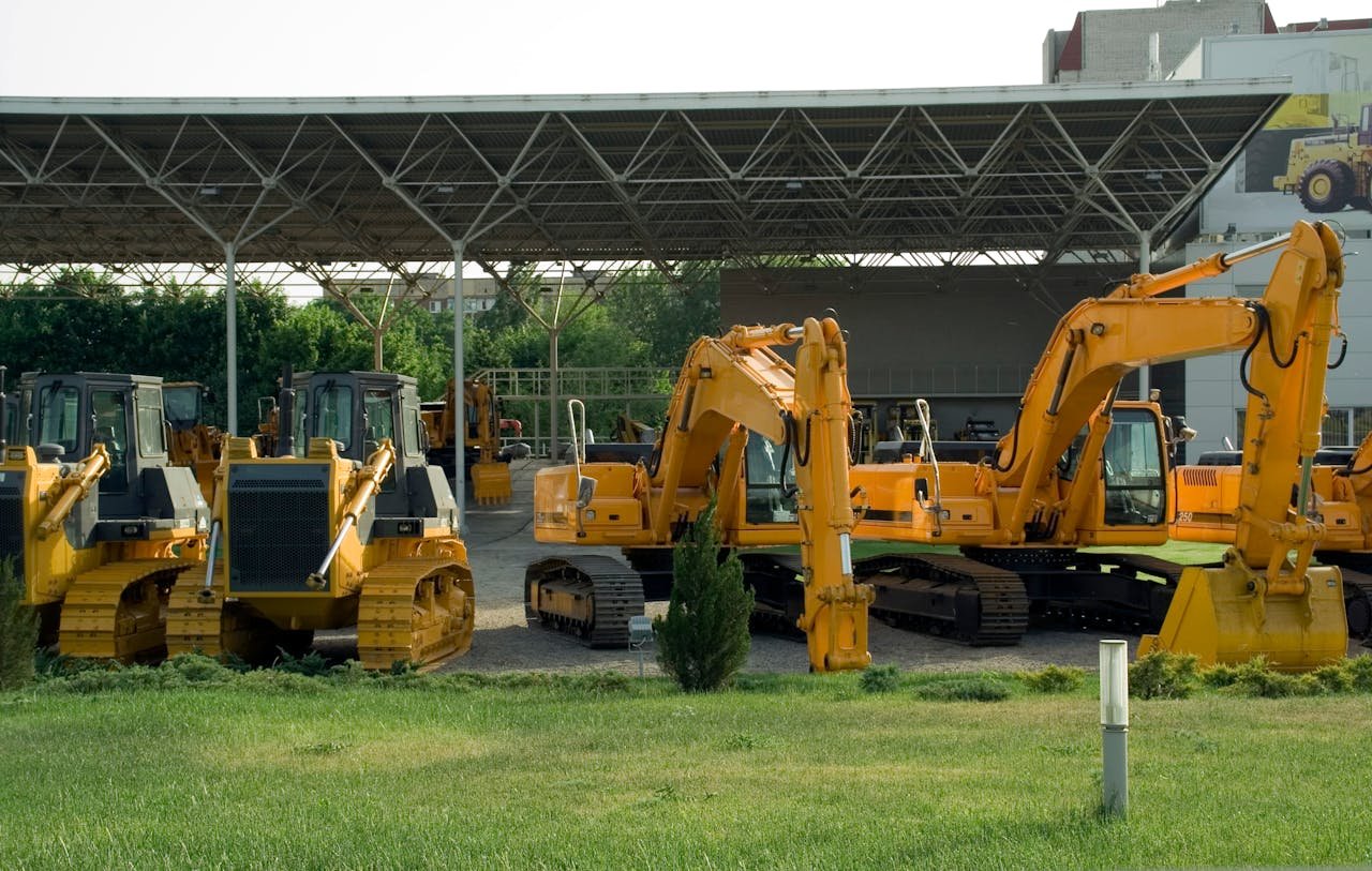 Crafting Captivating Headlines: Your awesome post title goes here Heavy-duty construction machinery displayed outdoors, include excavators and bulldozers.